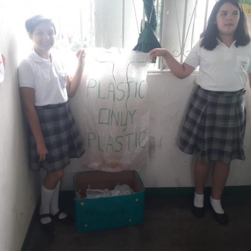Showing the bag that we are going t use to recycle plastic 